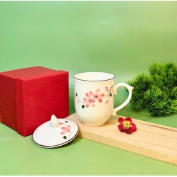 Cốc sứ có nắp Bát Tràng men kem hoa đào hồng